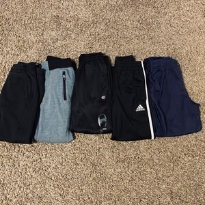 Lot of 5 pair of 7/8 pants.